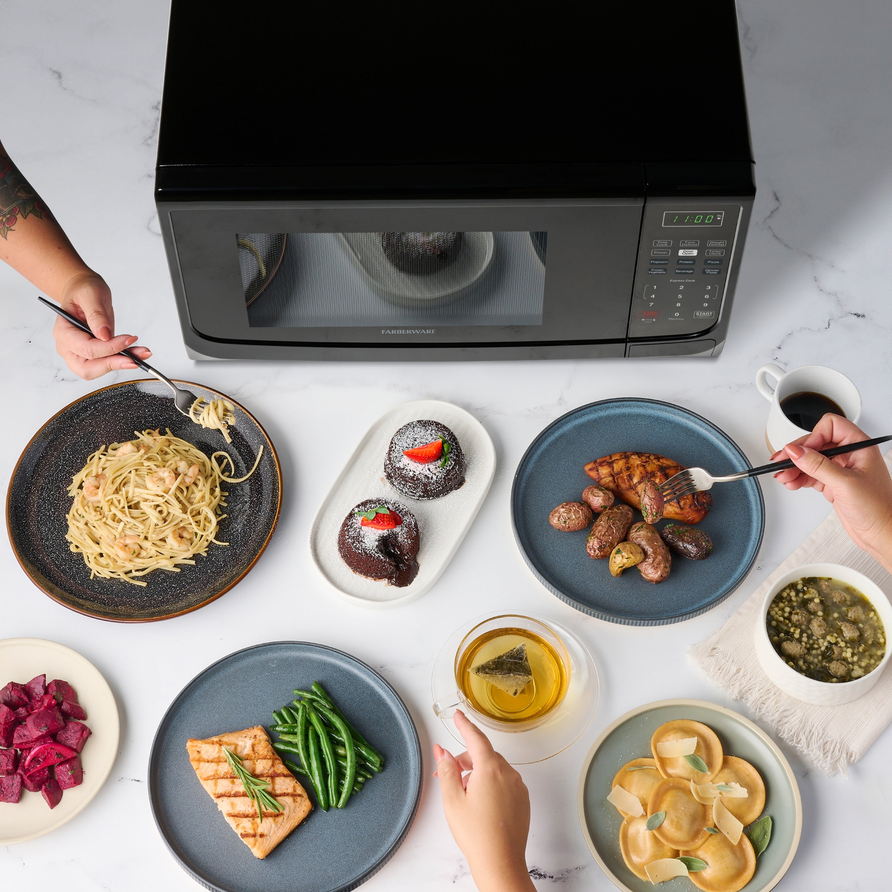 Farberware 1000-Watt 1.1 Cu. Ft. Countertop Microwave Oven With LED Lighting and Child Lock